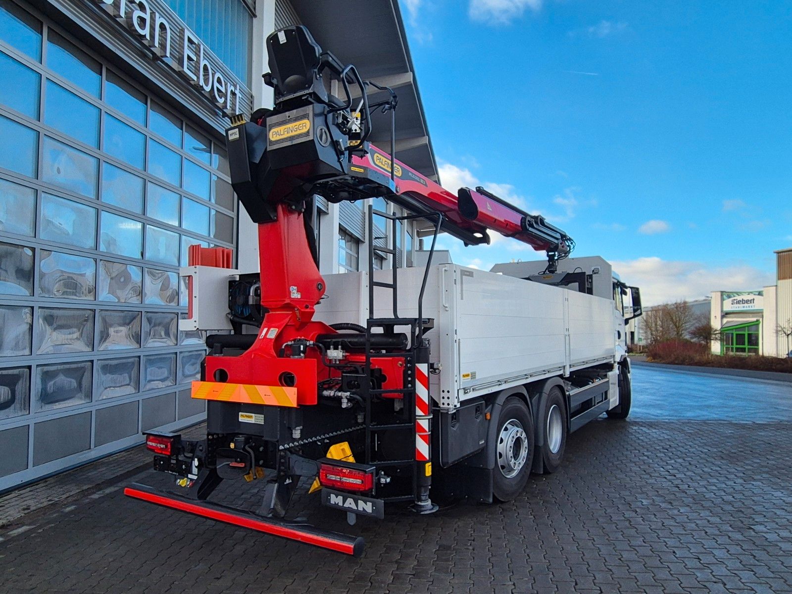 Fahrzeugabbildung MAN TGS 26.470 6x2-4 LL Baustoff Palfinger PK20.501L