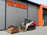 Takeuchi Laderaupe TL120 Inkl. Zubehör - Takeuchi Mini-/Kompaktbagger