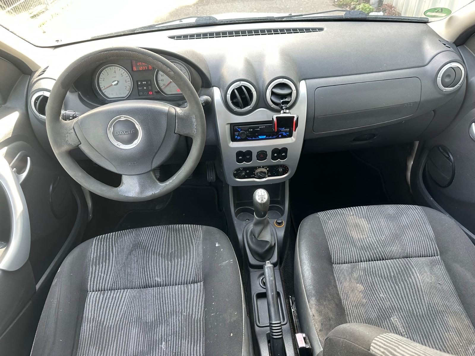 Dacia Logan 2009 — photo 13