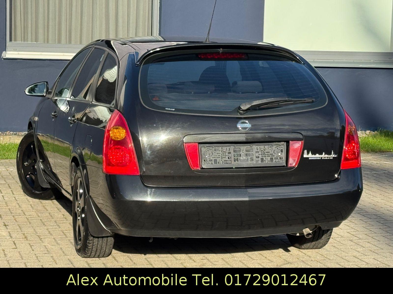 Nissan Primera 2005 — rear view