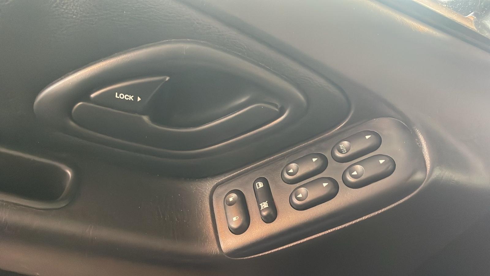 Ford Maverick 2004 — photo 16