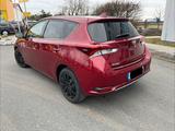 Toyota Auris Hybrid Edition-S+, 8-fach, Scheck - rote Toyota Auris