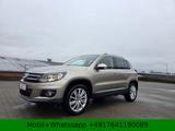 Volkswagen Tiguan Sport & Style BMT*12Monate Garantie - mit Benzin-Antrieb: Beige, Scheckheftgepflegt, Geländewagen