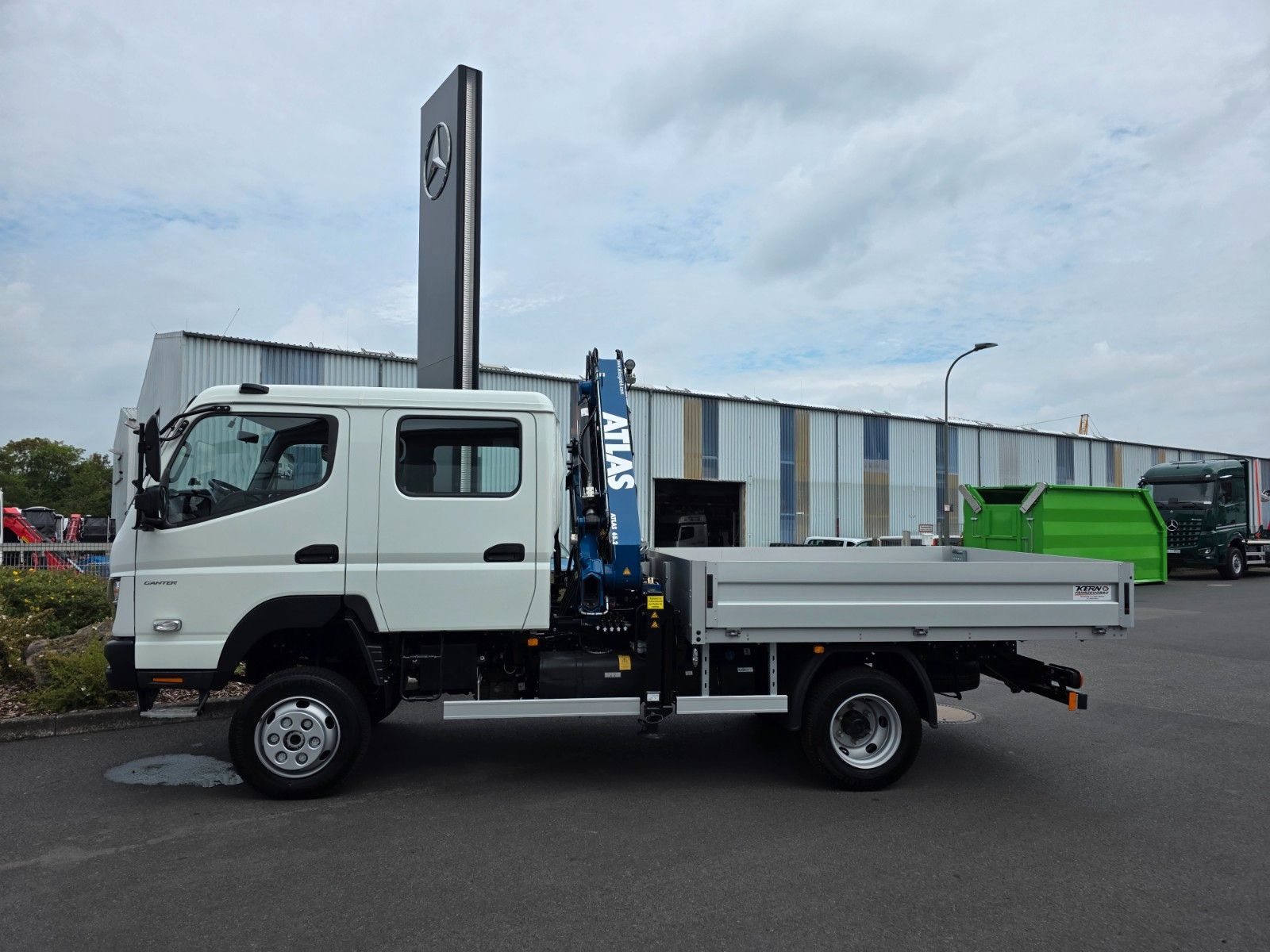 Fahrzeugabbildung Mitsubishi Fuso Canter 6C18D DoKa 4x4 Kran Atlas 65.2 - A2