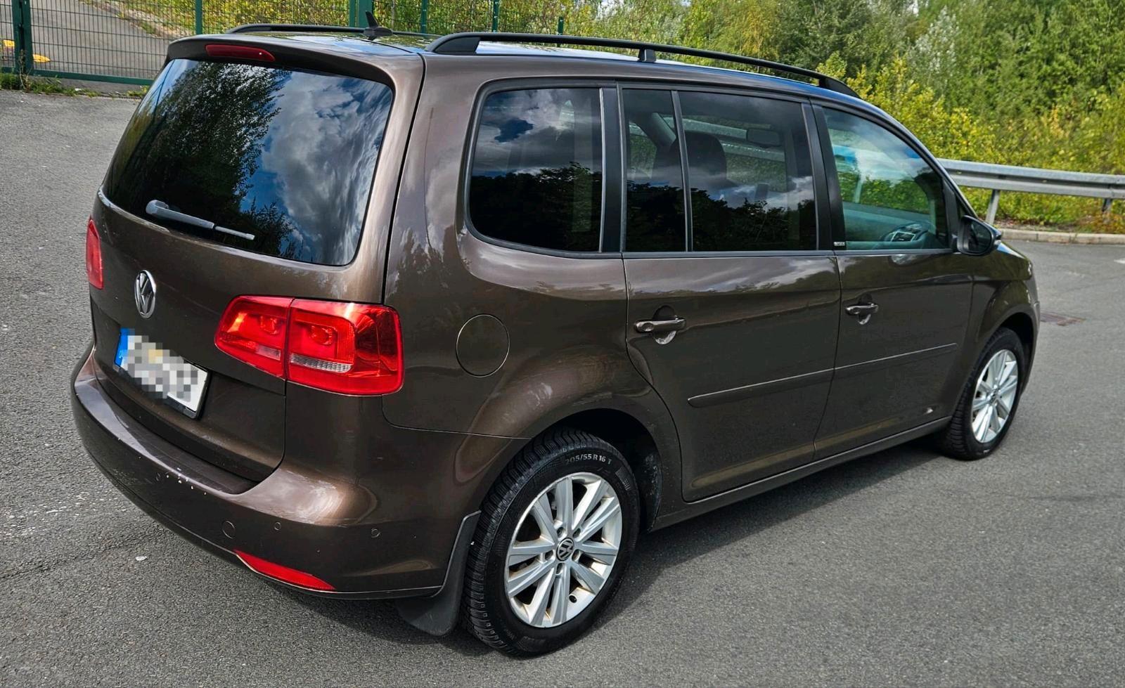 Volkswagen Touran 2011 — engine 105 HP (77kW)