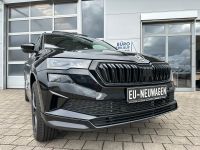 SKODA Karoq 2.0 TSI DSG 4x4 Sportline PANO AHK 5J GAR bei Autohaus Landmann & Maier OHG