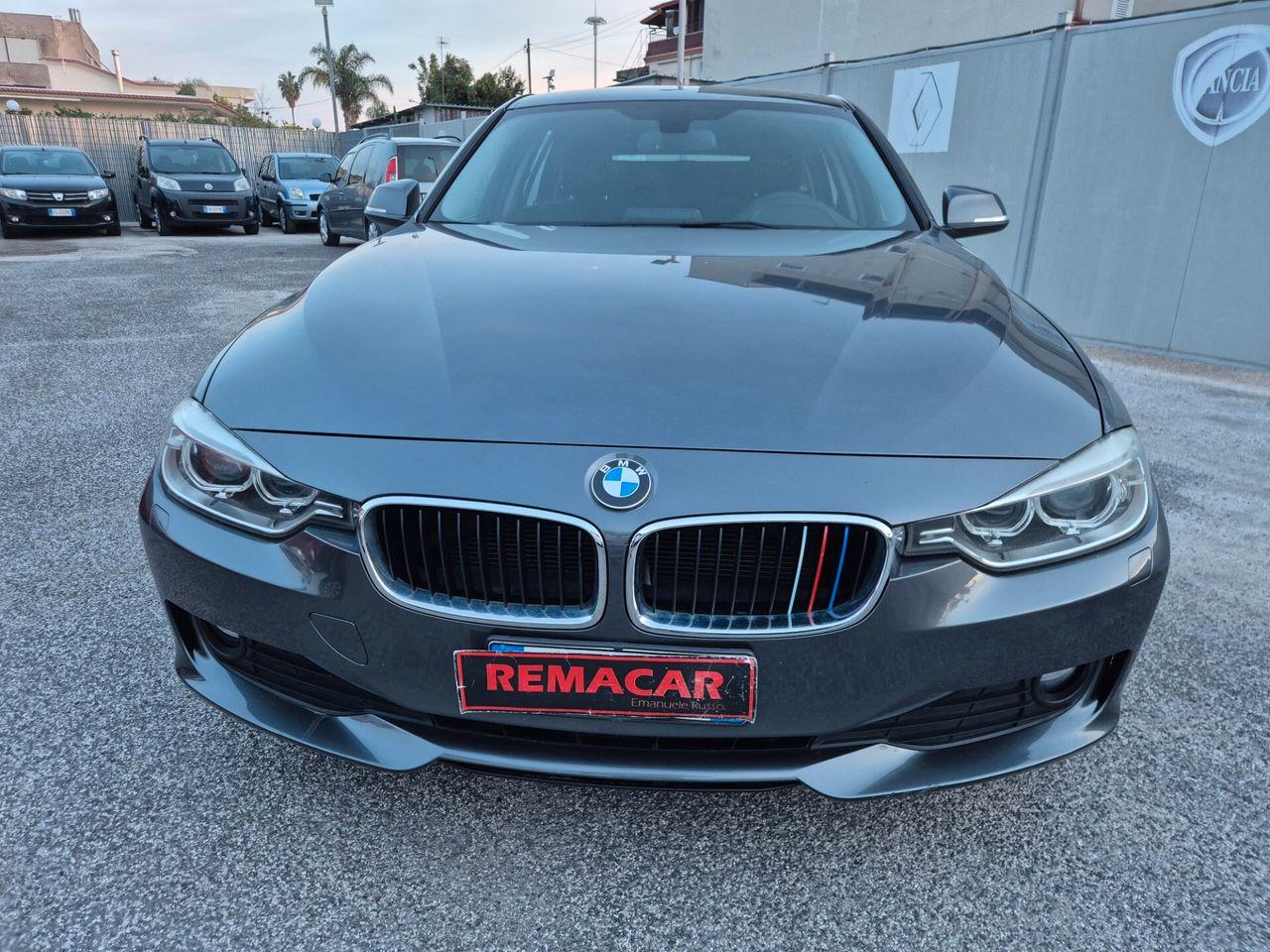 BMW 320 2014 — вигляд ззаду