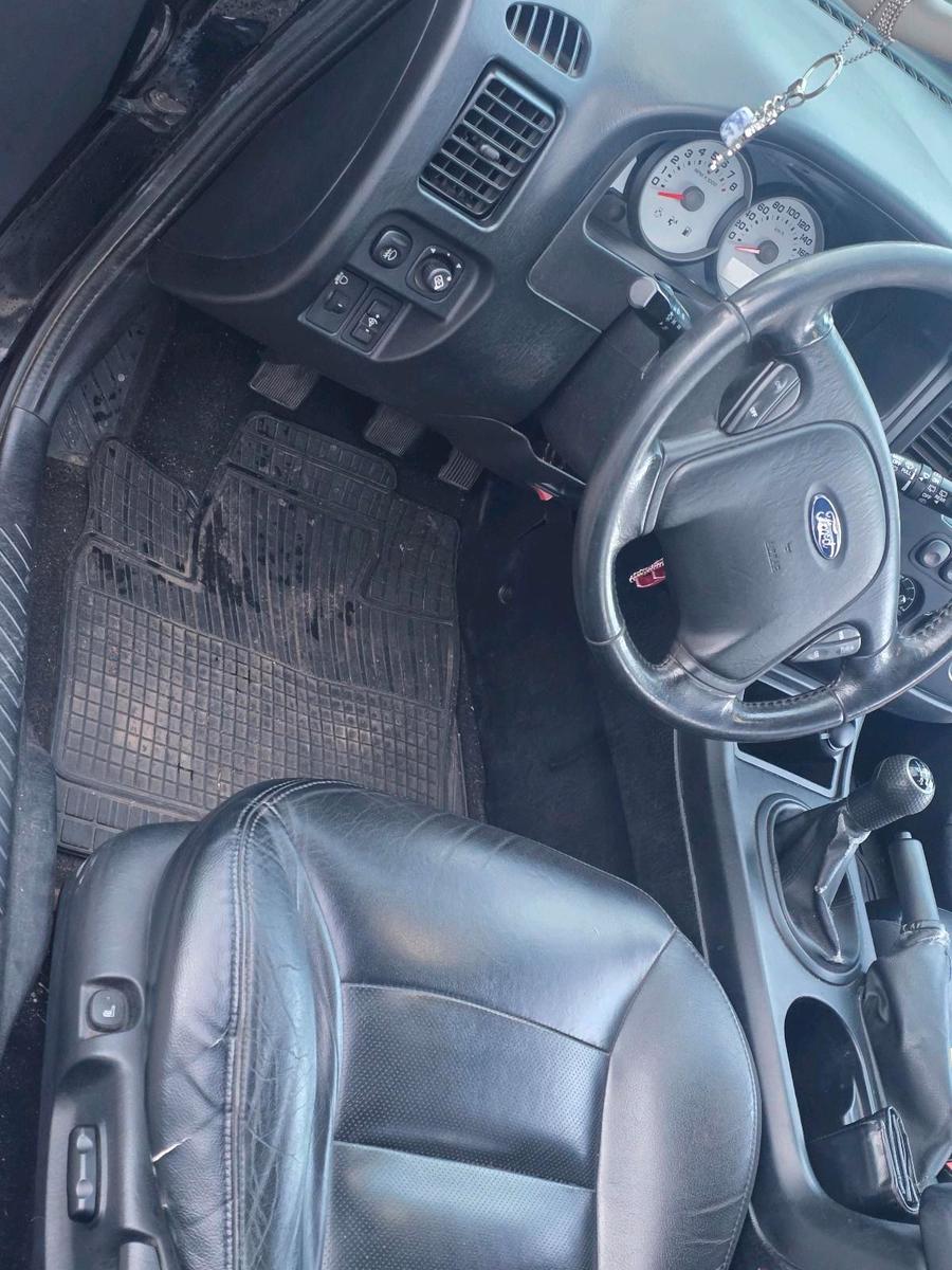 Ford Maverick 2005 — photo 8