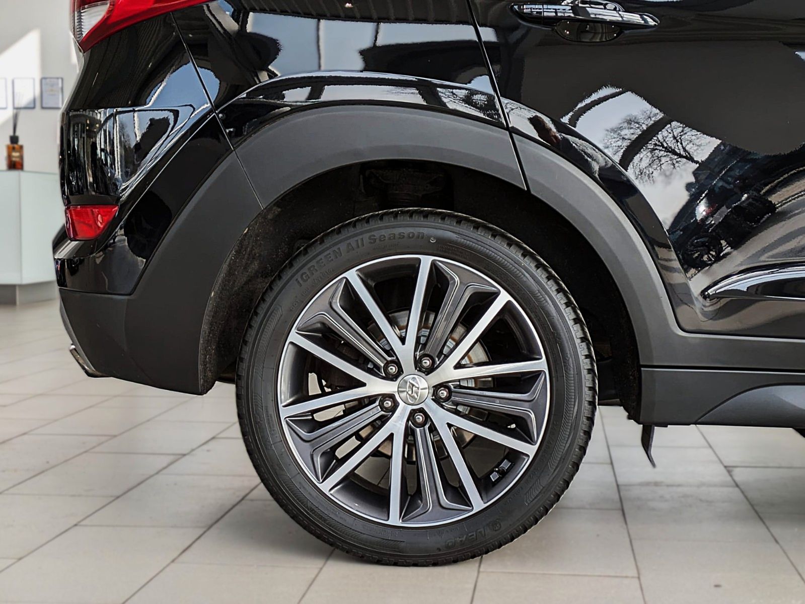 Fahrzeugabbildung Hyundai TUCSON 1.6i DTC PASSION SITZHZ ANDROID NAVI CAM