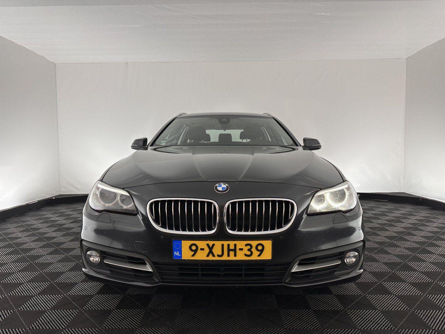 BMW 518 2014 — rear view