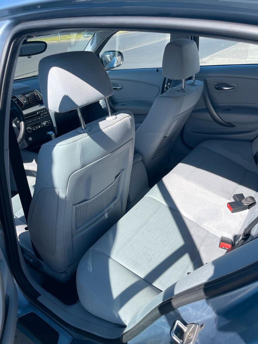 BMW 116 2010 — rear view