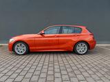 BMW F20 125i  M-Paket AHK Schalter - BMW: Orange