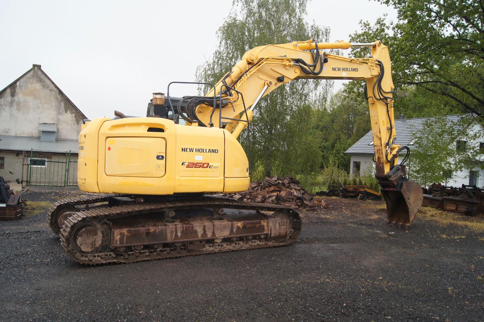 New Holland 260 Kanalbau und Stadt