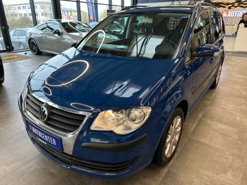 Volkswagen Touran  *7Sitzer*Navi*DSG*Sitzh*BiXenon*