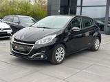 Peugeot 208 Active Metallic *TÜV neu* - mit Benzin-Antrieb: Schwarz, Limousine, Metallic