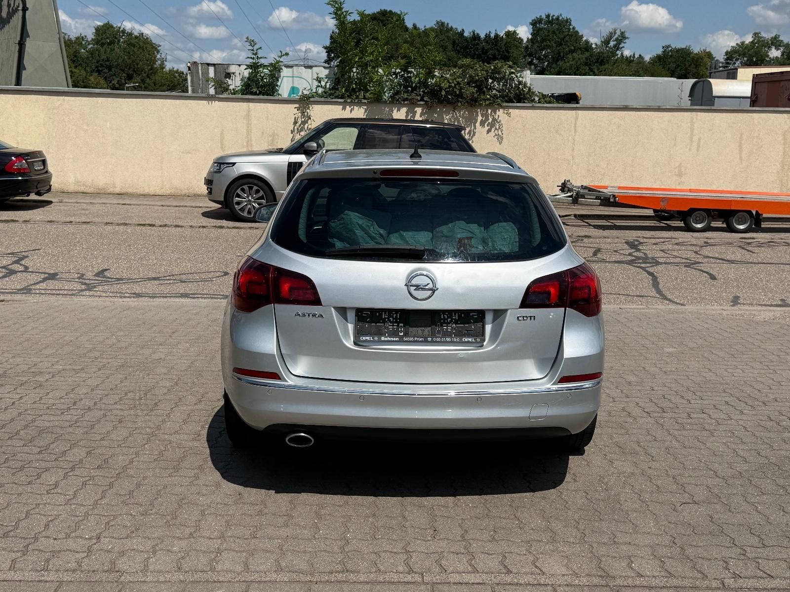 Opel Astra 2013 — engine 1.956 cm³, 165 HP (121kW)