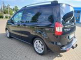 Ford Tourneo Courier - Neuer Zyl.Kopf / AHK / PDC - Ford Tourneo aus 2014