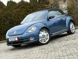 Volkswagen New Beetle - Volkswagen New Beetle mit Benzin-Antrieb: Leder