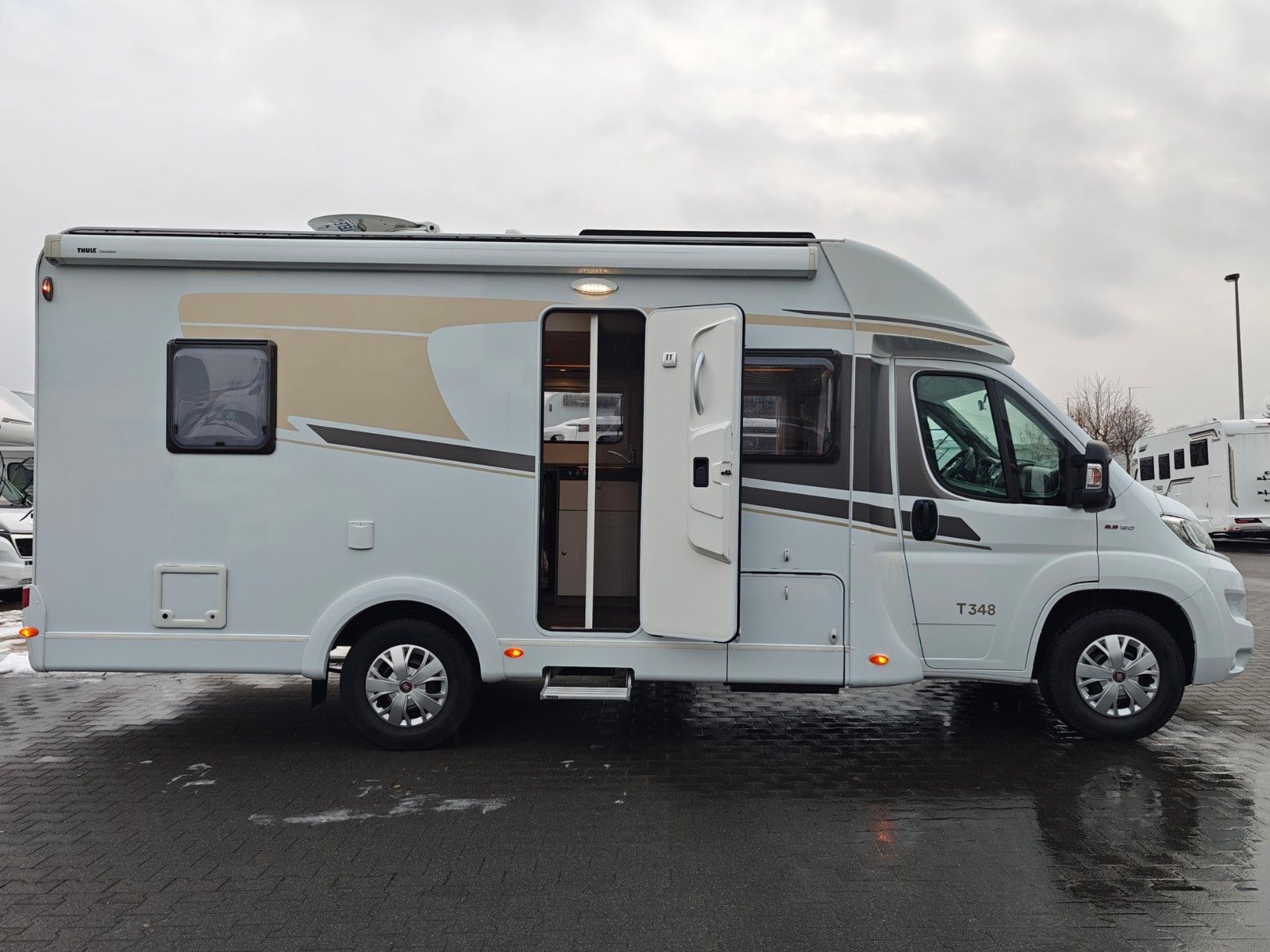 Fahrzeugabbildung Carado T-348 - Automatik, SAT, TV, 2x Solar, Hubbett -