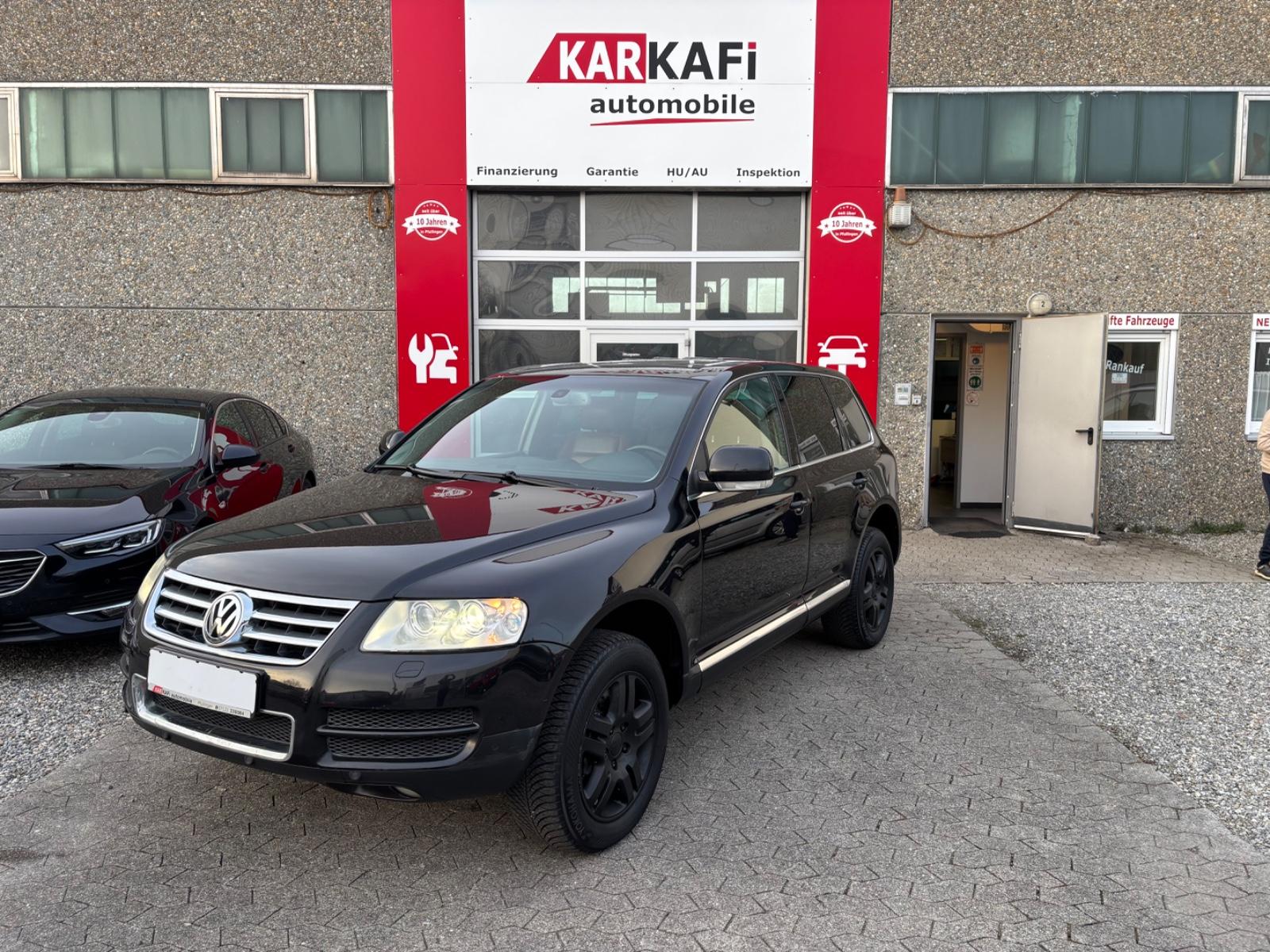 Volkswagen Touareg 2005 — photo 32