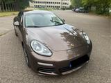Porsche Panamera - Scheckheft - 4 Punkt Scheinwerfer - Porsche Panamera: Braun