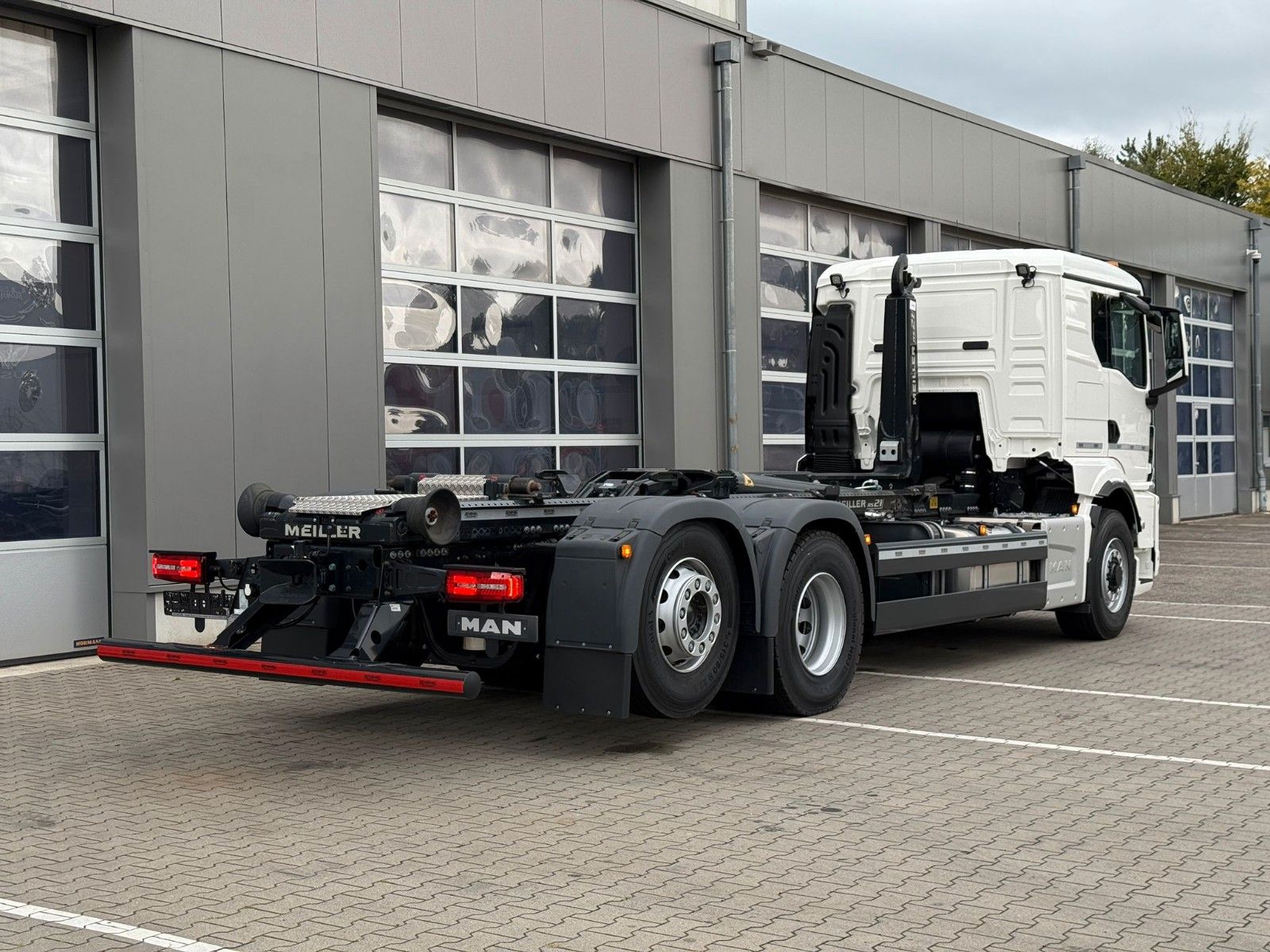 Fahrzeugabbildung MAN TGS 26.520 6x4H-2 BL MEILLER RS 21.70 Funkfernb.