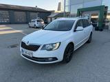 Skoda Superb 2.0 TSI DSG L & K Combi - Skoda Superb aus 2014 mit Benzin-Antrieb: Kombi