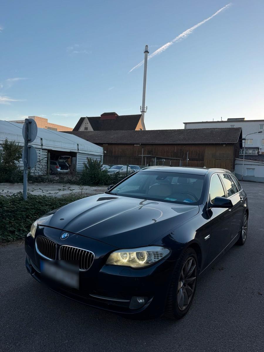 BMW 535 2011 — rear view