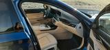 BMW 740d xDrive Garantie und Servicepaket - blaue BMW 740