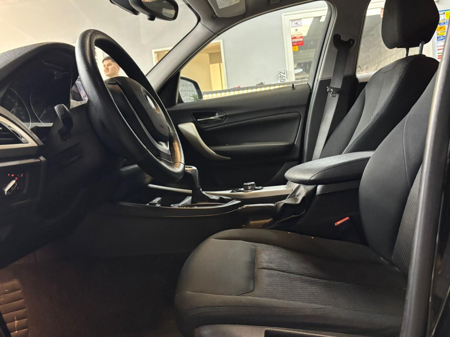 BMW 114 2014 — photo 16