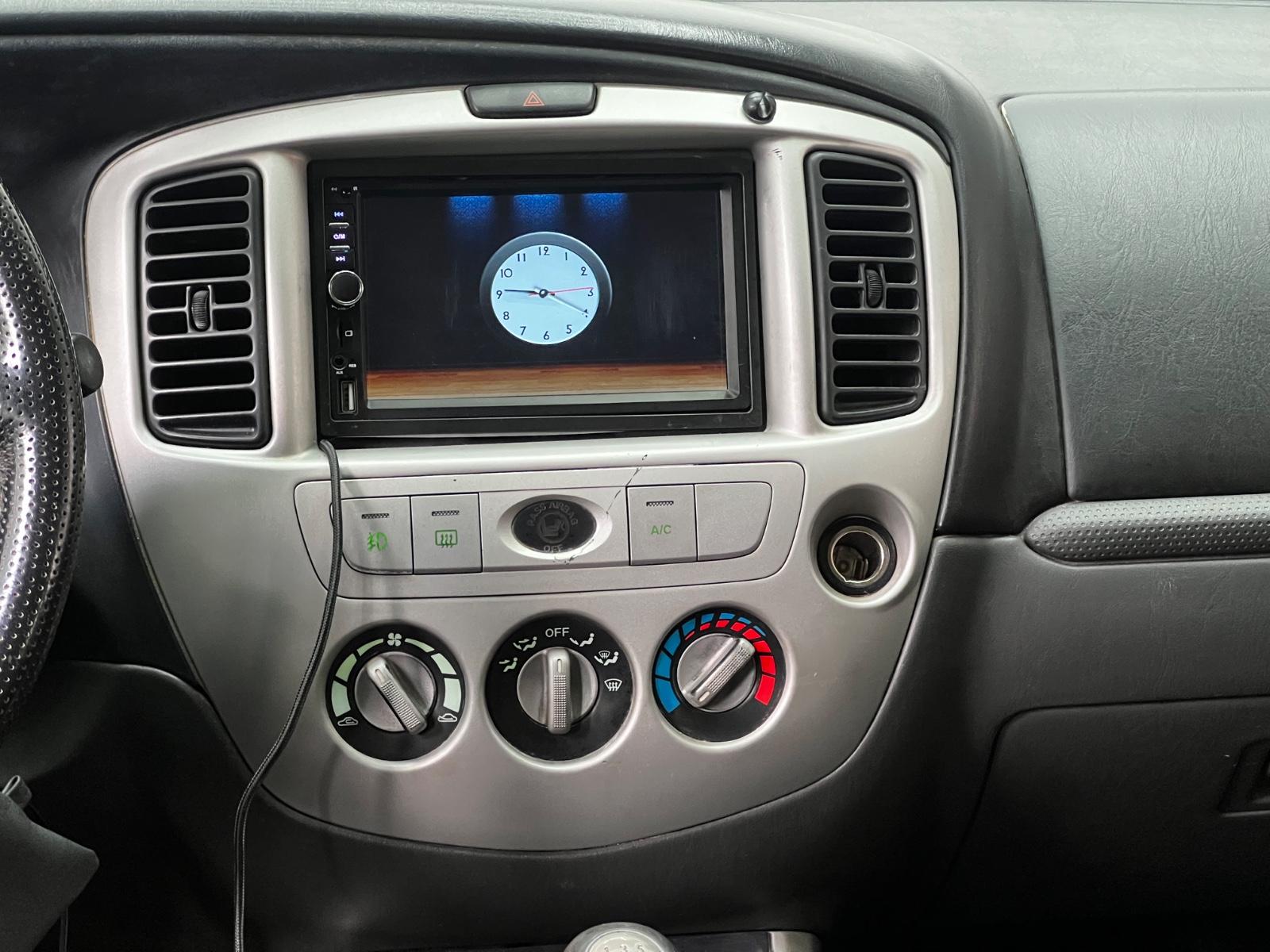 Mazda Tribute 2005 — фото 12