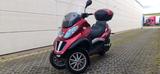 Piaggio MP3 400 ie - PIAGGIO MP4