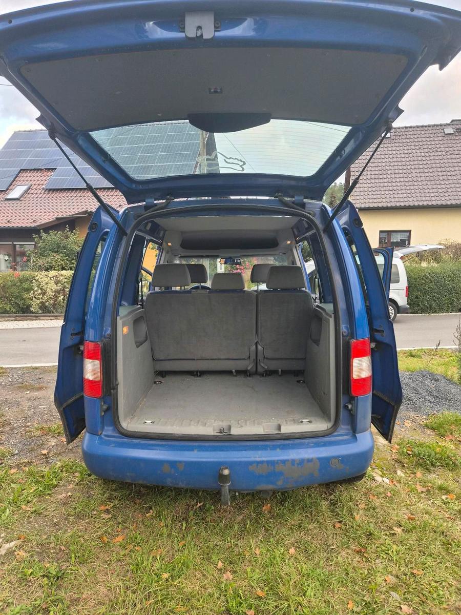 Volkswagen Caddy 2006 — engine 102 HP (75kW)