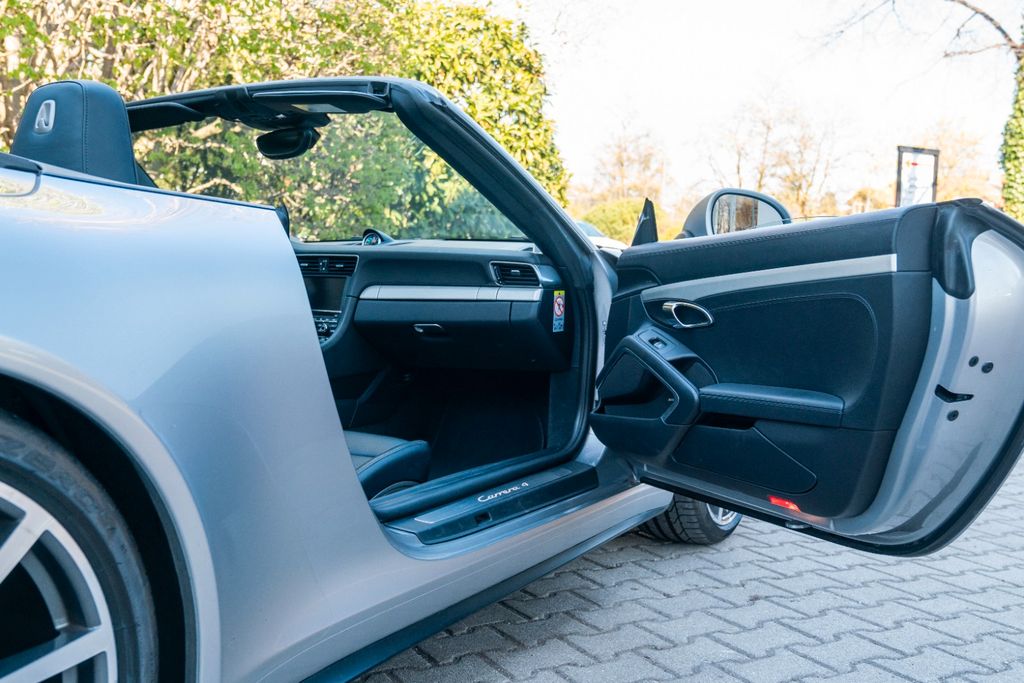PORSCHE 991 Carrera 4 Cabriolet/ PASM / SPORT AGA / BOSE PORSCHE 991 Carrera 4 Cabriolet/ PASM / SPORT AGA / BOSE