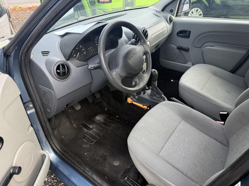 Dacia Logan 2011 — photo 17