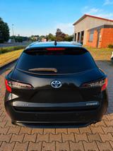 Toyota Corolla 2,0 Hybrid Team Deutsch Touring Spor... - Toyota Corolla Gebrauchtwagen in Bremen