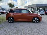 Suzuki SWIFT COMFORT+ - Suzuki Swift mit Benzin-Antrieb: Orange