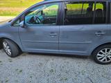 Volkswagen Touran 1.9 TDI DPF Freestyle BlueMotion Free... - Volkswagen Touran aus 2009: Freestyle