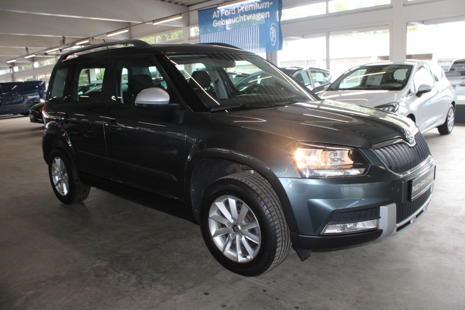 Fahrzeugabbildung SKODA Yeti 1.4 TSI Green tec Ambition Outdoor AHK 1.Hd