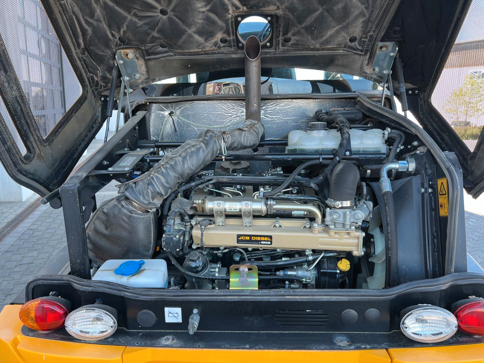Fahrzeugabbildung JCB 409 SV / nur 758h! / Klappschaufel / Gabel
