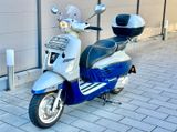 Peugeot Django 125i - PEUGEOT MOTORRAD