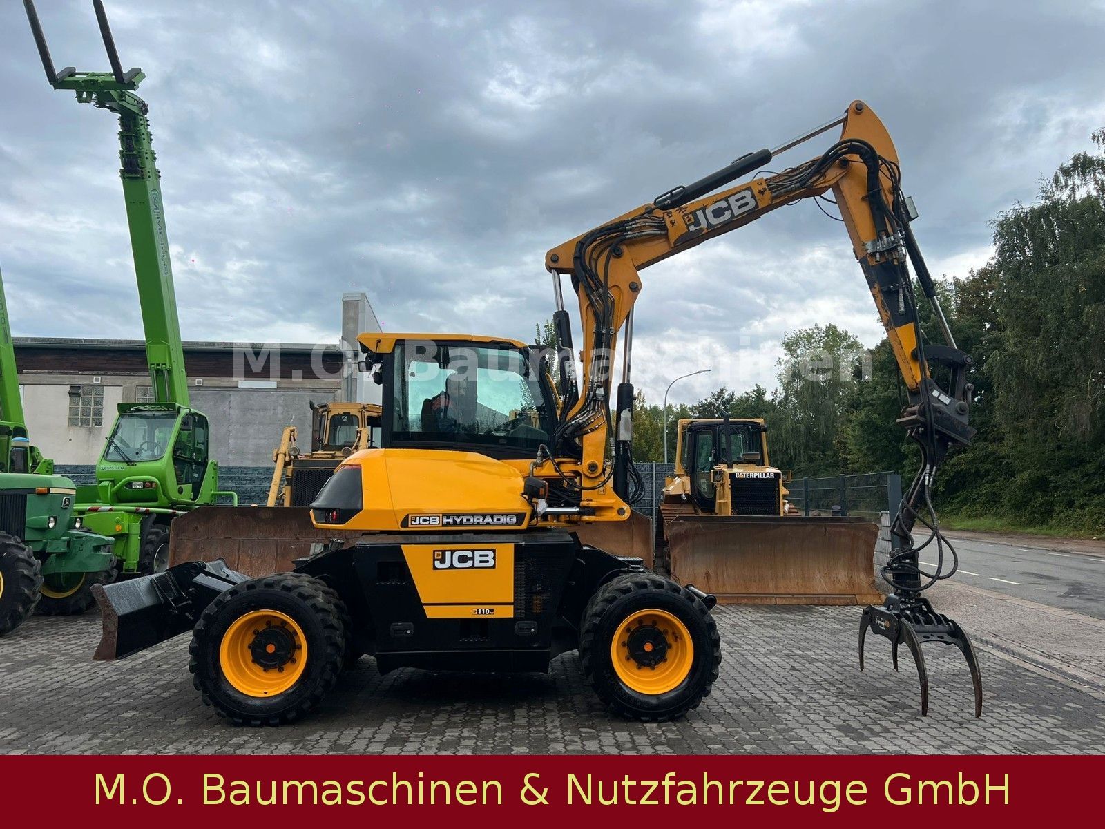 Fahrzeugabbildung JCB 110 W Hydradig / Holzgreifer / 2x Tieflöffel
