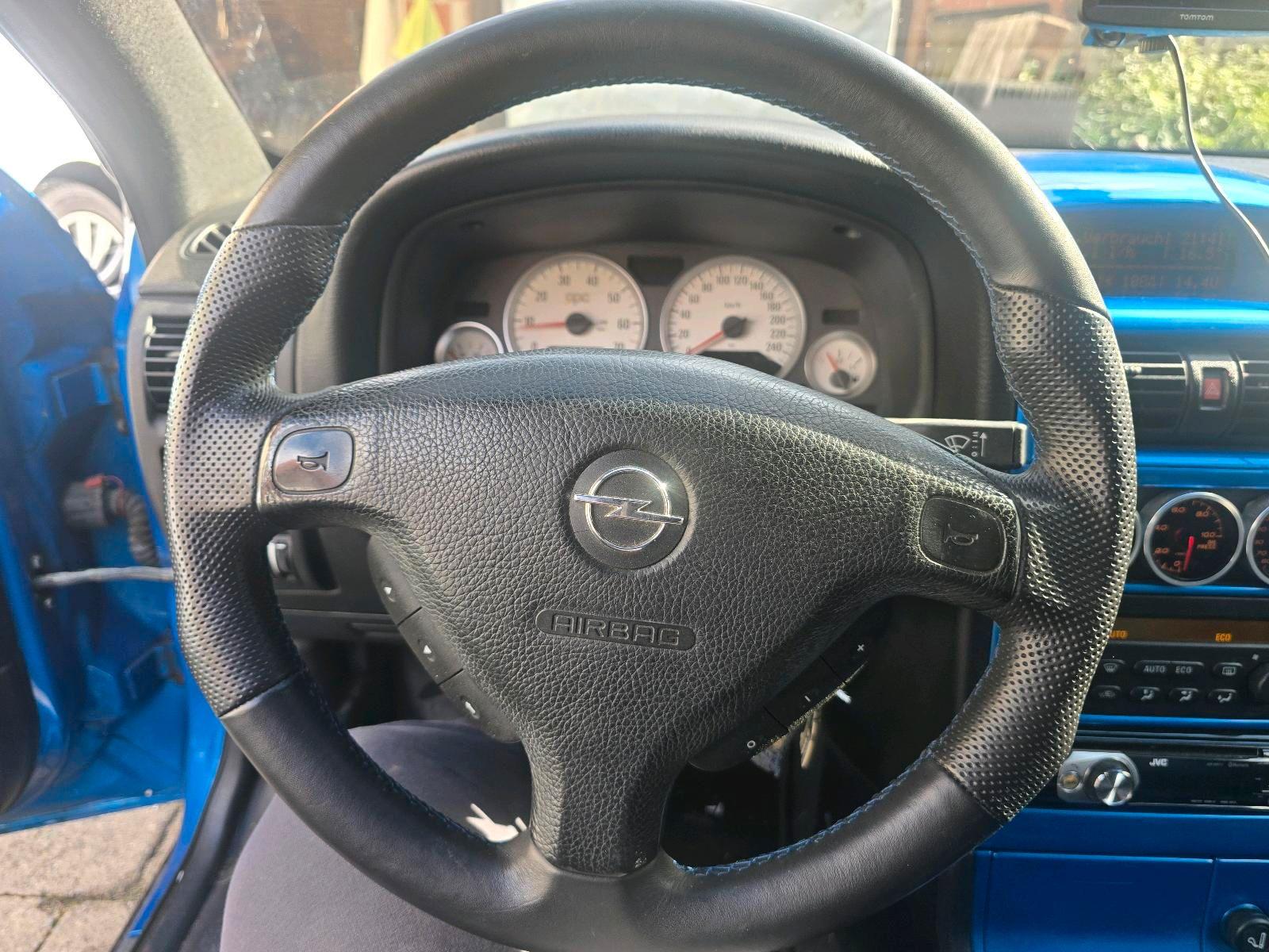 Opel Astra 2004 — photo 12