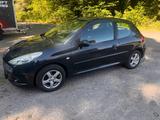 Peugeot 206 plus - Peugeot 206: Plus