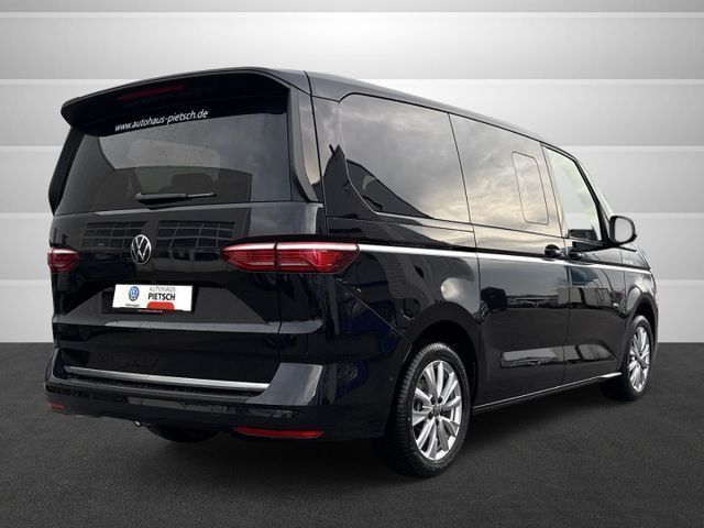 Volkswagen T7 Multivan 2.0 TDI DSG lang Style AHK ACC Pano foto 4