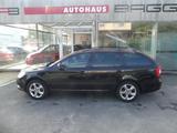 Skoda Octavia Combi Ambition - Skoda Octavia aus 2012 mit Benzin-Antrieb: Kombi