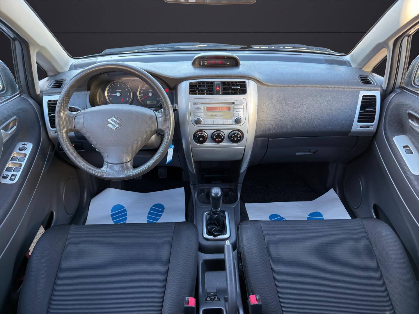 Suzuki Liana 2005 — photo 14