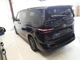 Volkswagen T7 Multivan 2.0TDI LÜ Lang LED/HUD/STHZ/AHK/PANO - gebrauchte VW T7 Multivan aus dem Jahr 2024