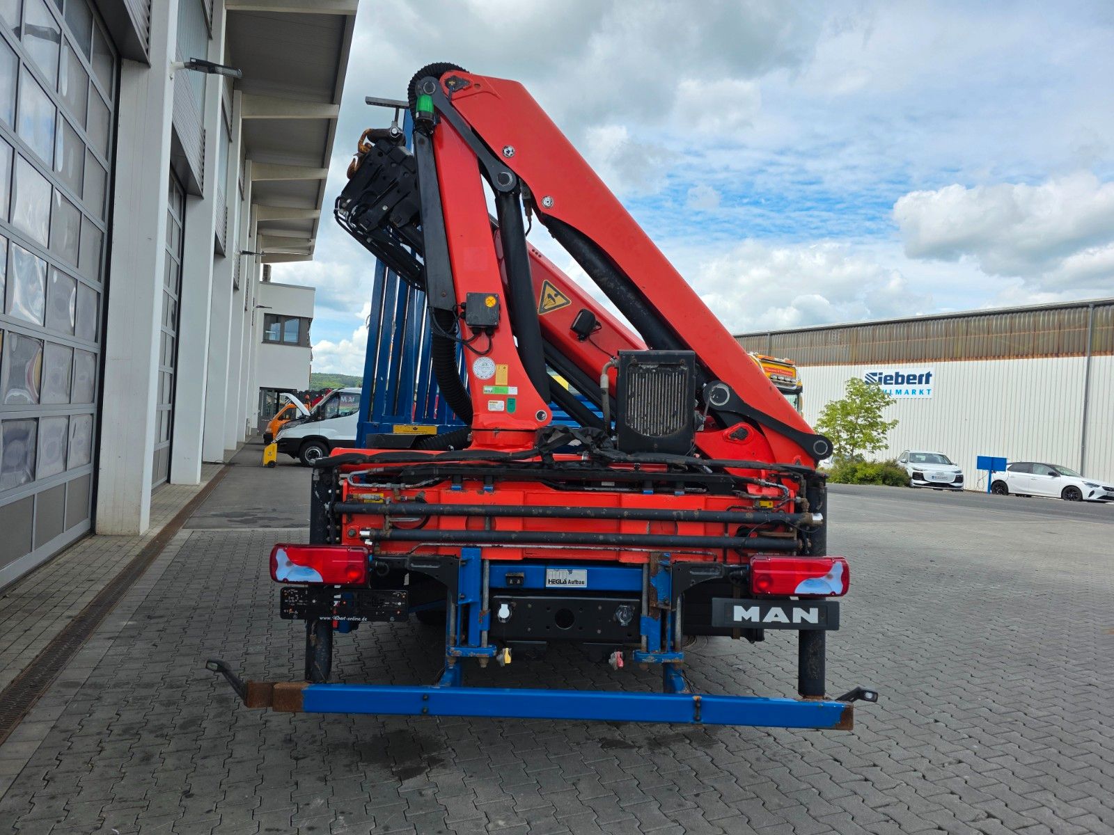 Fahrzeugabbildung MAN TGL 12.250 BL Glasreff Palfinger PK 9002EH Funk