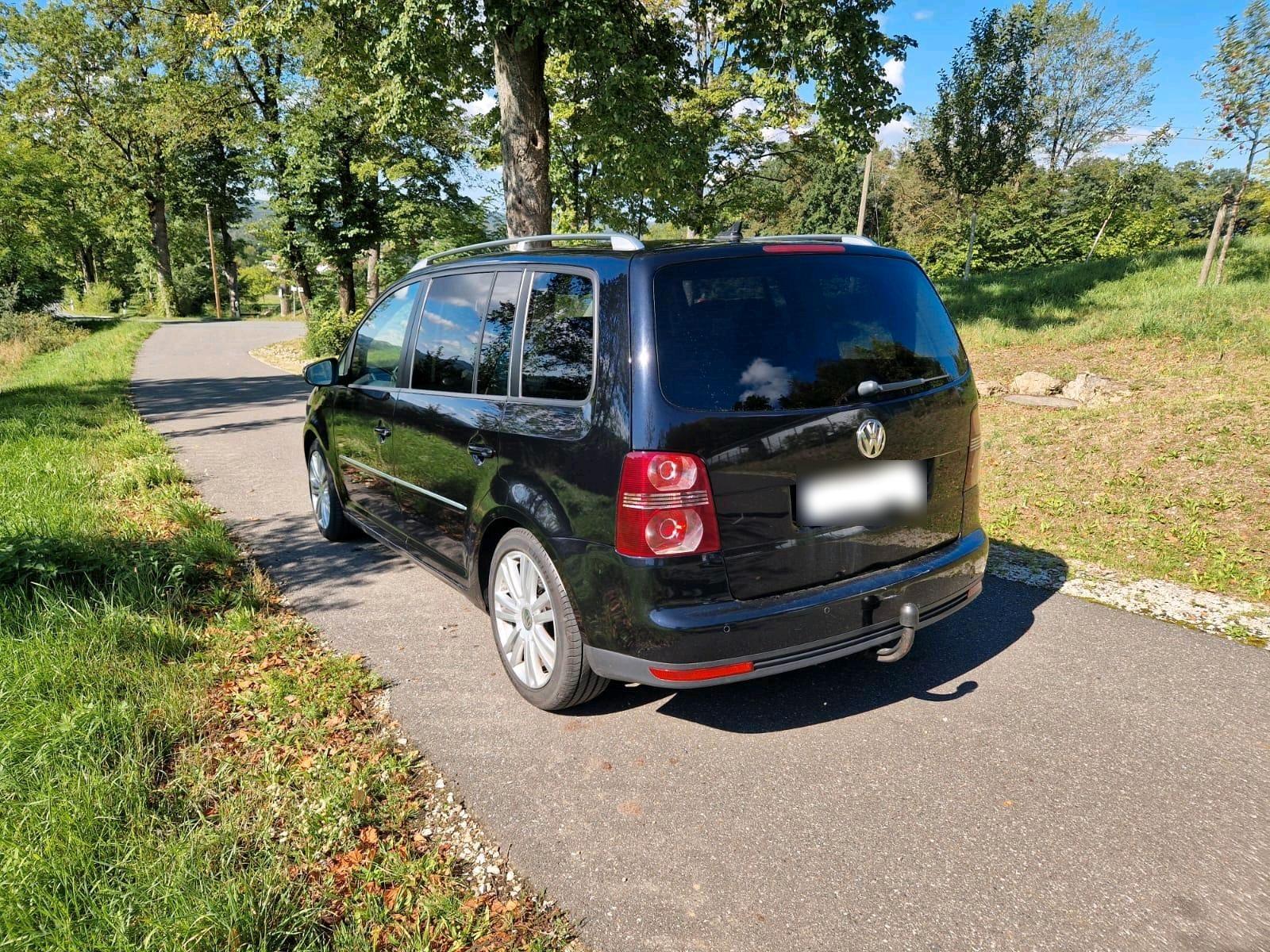 Volkswagen Touran 2009 — engine 140 HP (103kW)